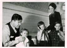 Jim and Mae Braddock with Their Three Children