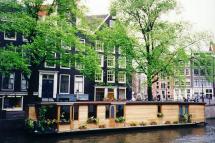 View of a Canal and Houseboat in Amsterdam