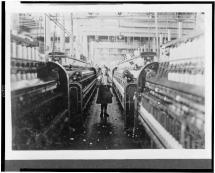 Young Girl at a Cotton Mill Machine