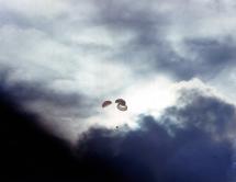 Apollo 13 Descending from a Near-Fatal Trip to Space